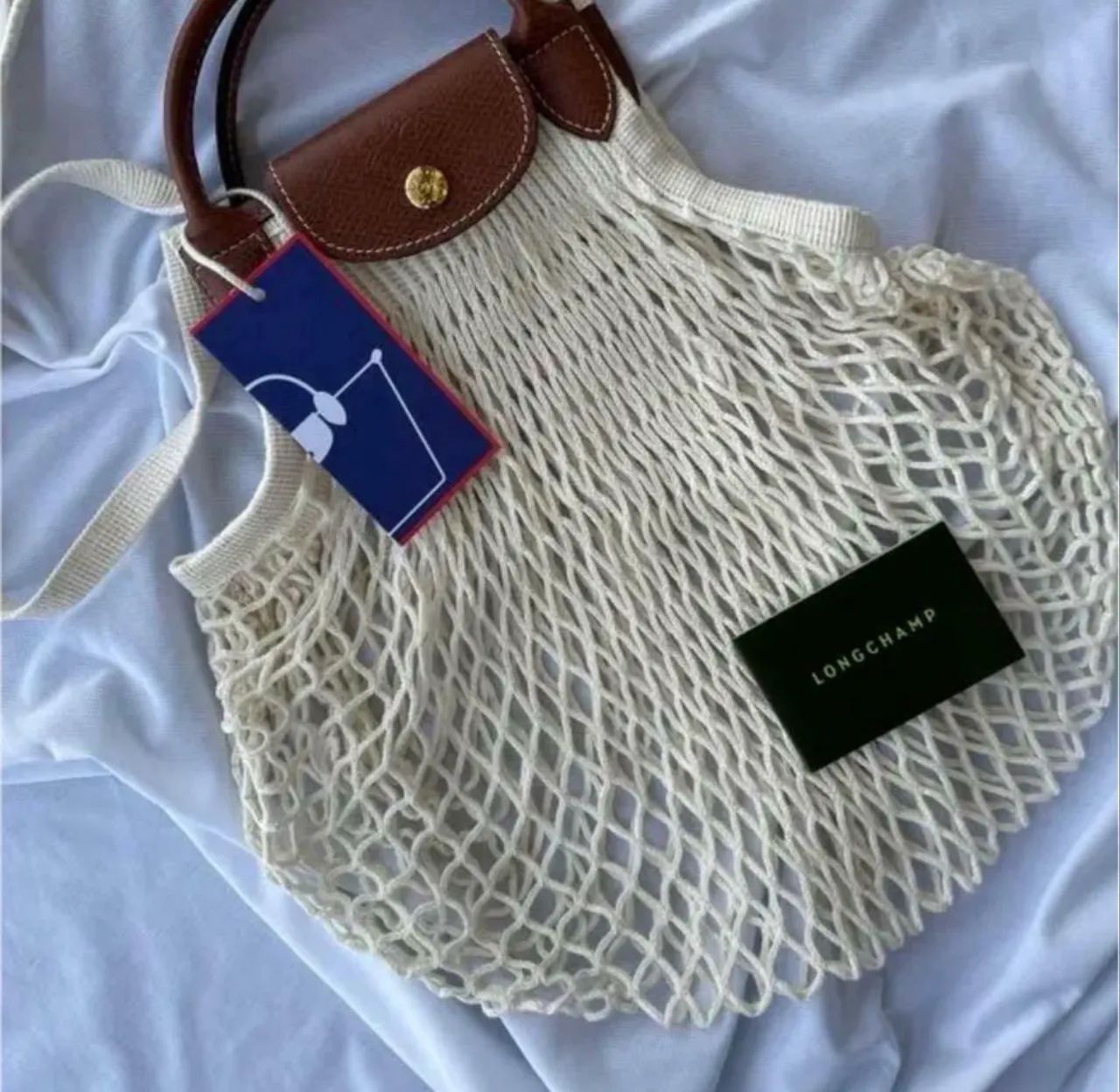 Bolsa crochê Longchamp bege