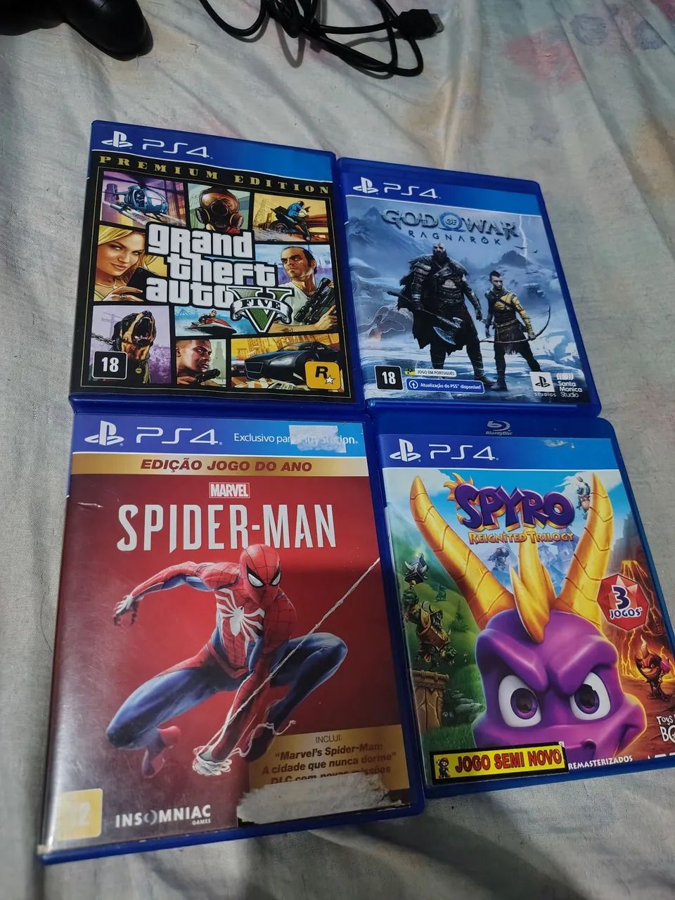 PS4 SLIM 1TB + 2 CONTROLES + GOD OF WAR RAGNAROK + JOGOS - Foto 4