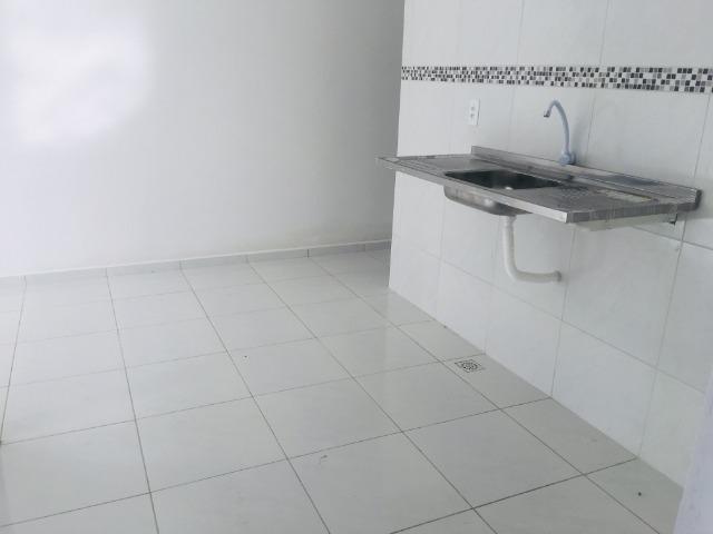 Documentação Inclusa: 2 quartos, 2 wcs, garagem, sala, coz americana, quintal, área serviç - Foto 8
