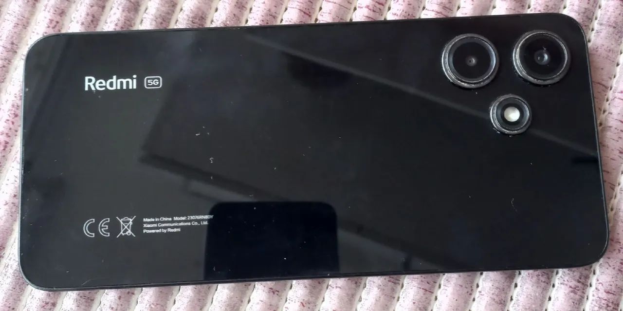 Celular Redmi 12 5G, Hype4 OS, funcionando perfeitamente 