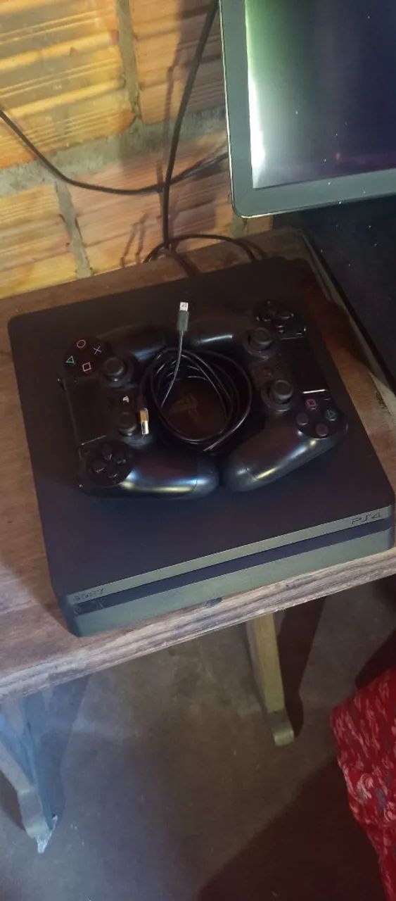 Ps4 slim 1 terá com jogos  - Foto 2