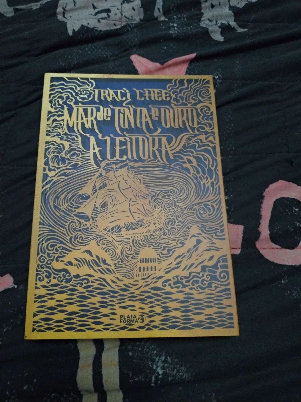 Mar de tinta e ouro a leitora
