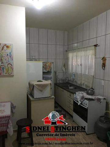Casa na Praia, 02 dormitórios, laje, piso cerãmico e terreno todo murado - Foto 11
