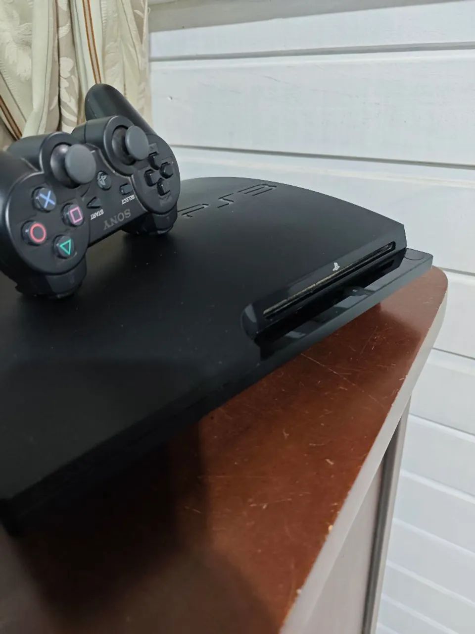 PS3 slim só pegar e jogar vários jogos no hd - Foto 3