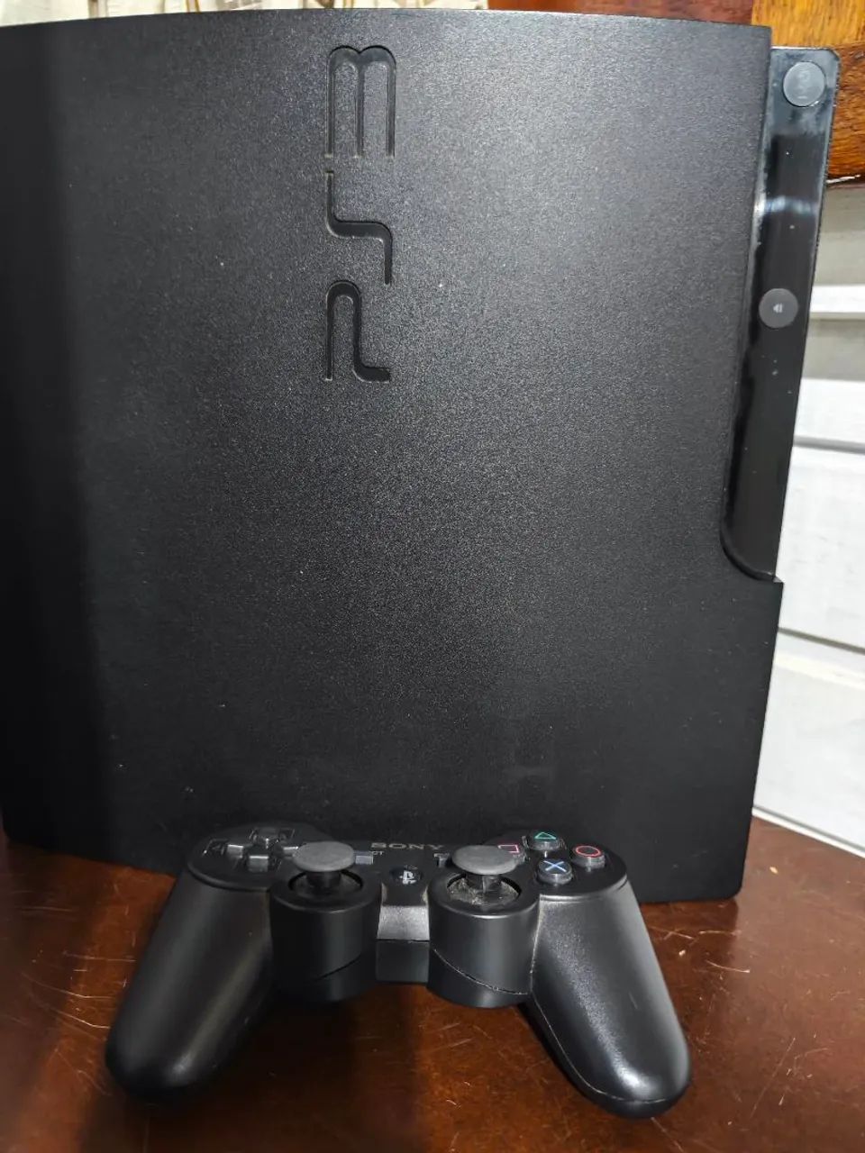 PS3 slim só pegar e jogar vários jogos no hd - Foto 2
