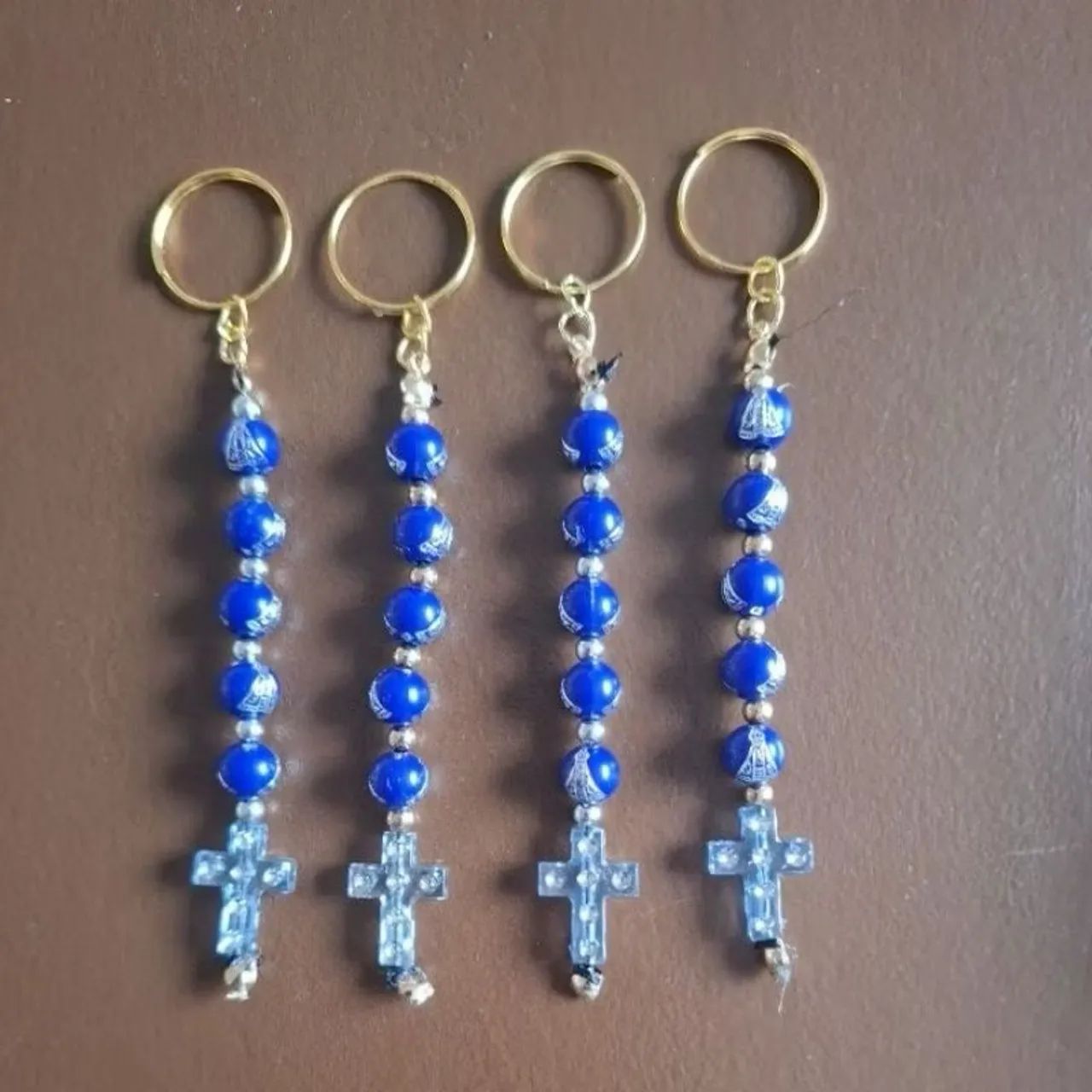 kit com 4 chaveiros de Nossa Senhora Aparecida,