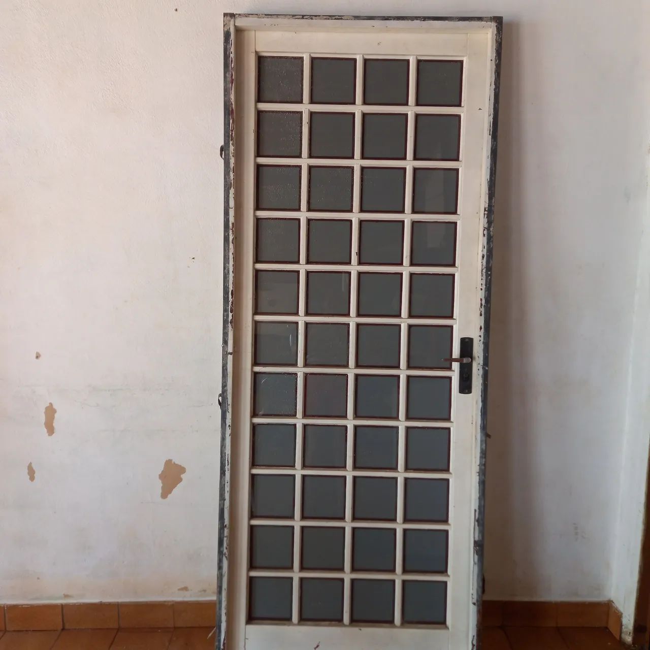 Vendo uma porta de  ferro  64840780065921124