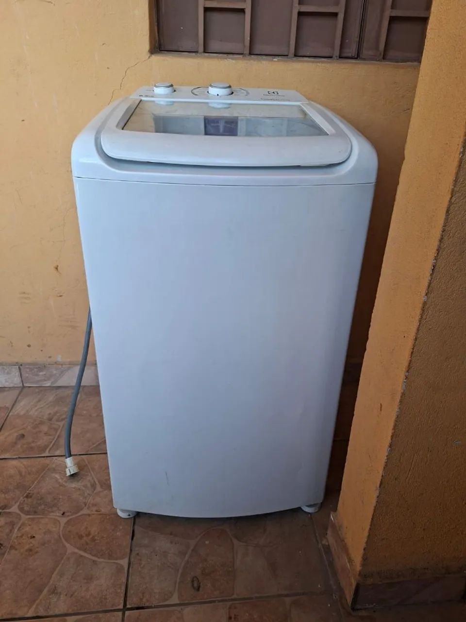 Máquina de lavar com defeito 