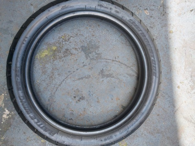 pneu usado Bridgestone battle Wing 110/80-19 - Foto 4