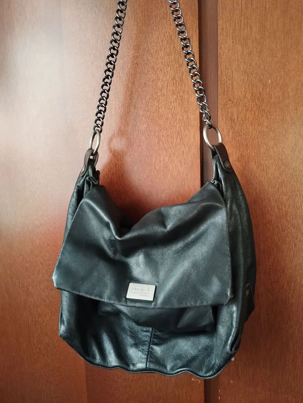 Bolsa uncle k couro 