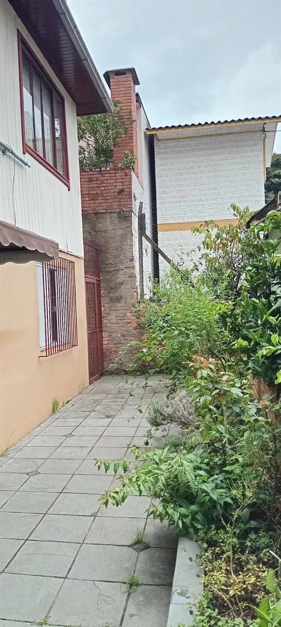 TERRENO COM DUAS CASAS PARA VENDA CENTRO