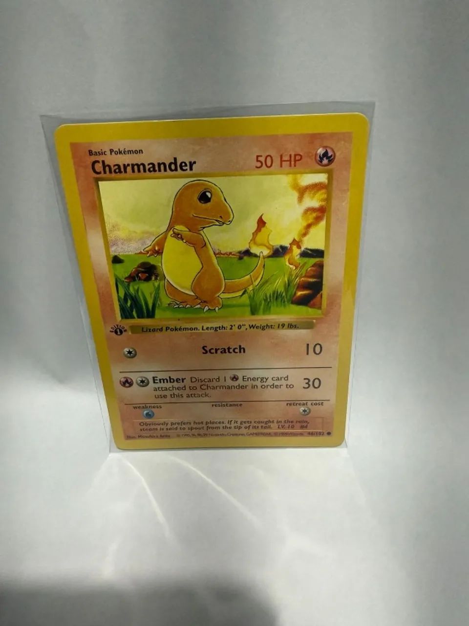 first edition charmander card Charmander Pokemon Base Set 1st Edition #46 SGC 7 #1