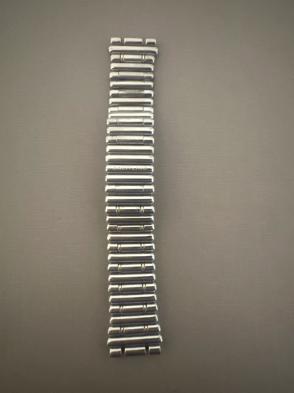Pulseira aço com detalhe em ouro BREITLING original 