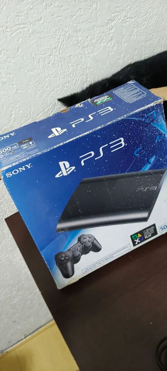 PS3 super slim na caixa original com 3 controles e 2 jogos. - Foto 2
