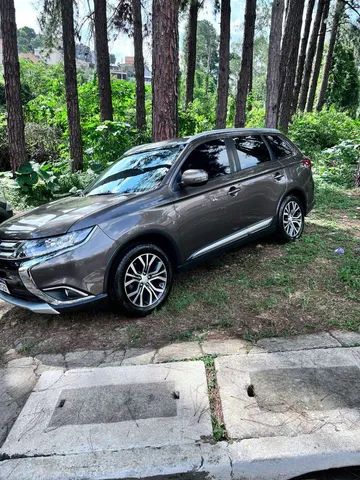 Outlander comfort com teto top de linha