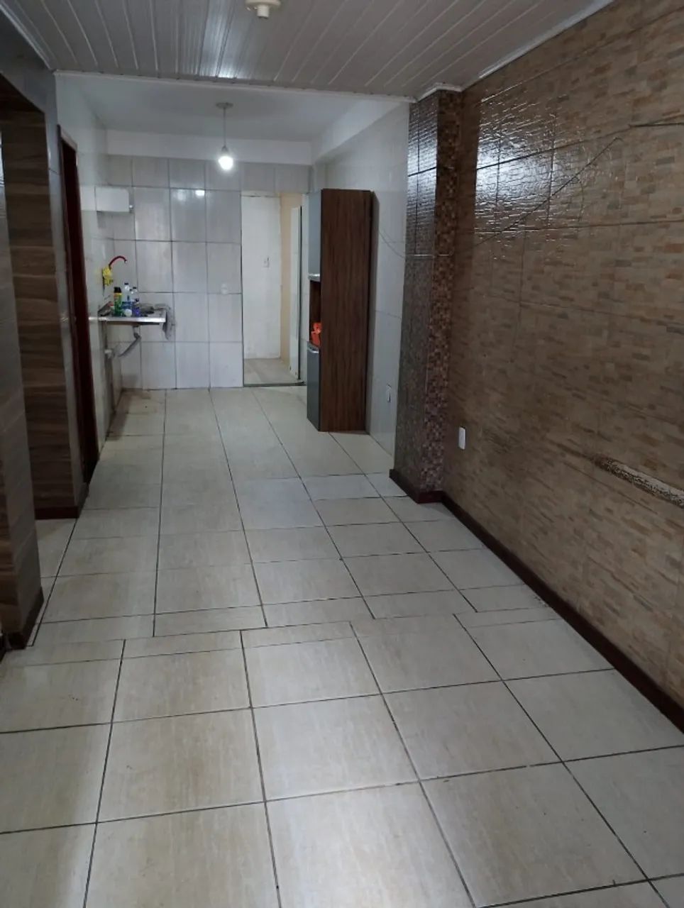 Casa no caminho de areia
