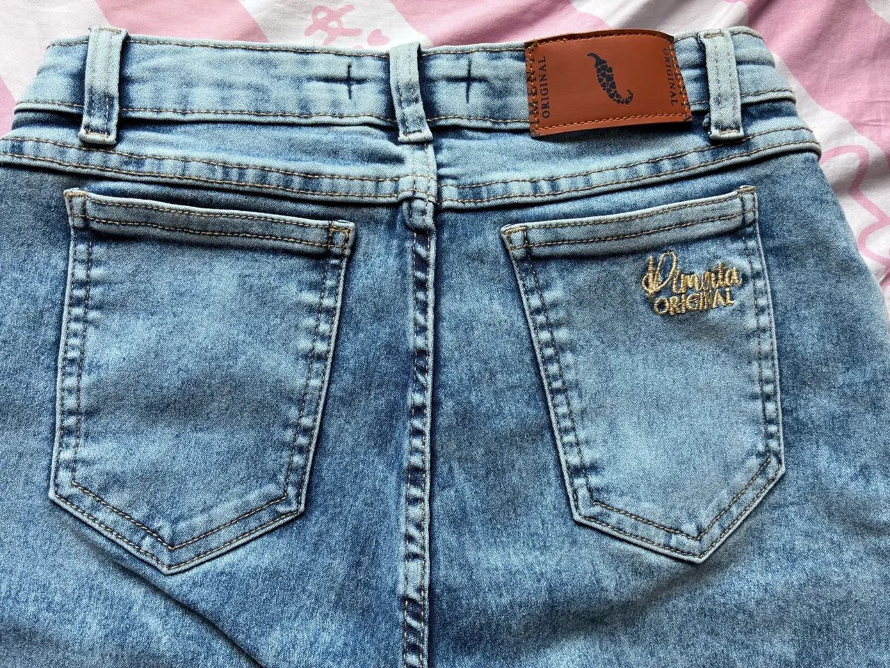Calca jeans marmorizada pimenta original 