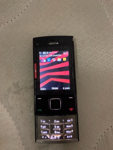 Nokia X3 xpressmusic, c/carregador original. relíquia!