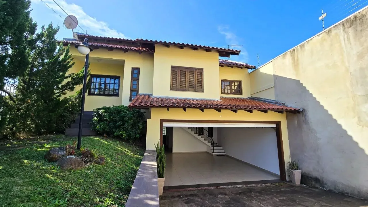 Casa com 3 dormitórios para alugar, 223 m² por R$ 7.200,01/mês - Jardim América - São Leop