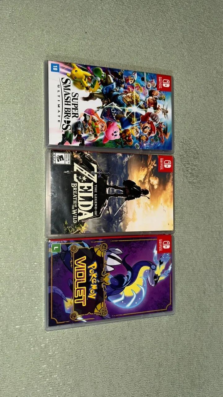 Nintendo Switch + 3 jogos (Zelda, Smash e Pokémon) - Completo