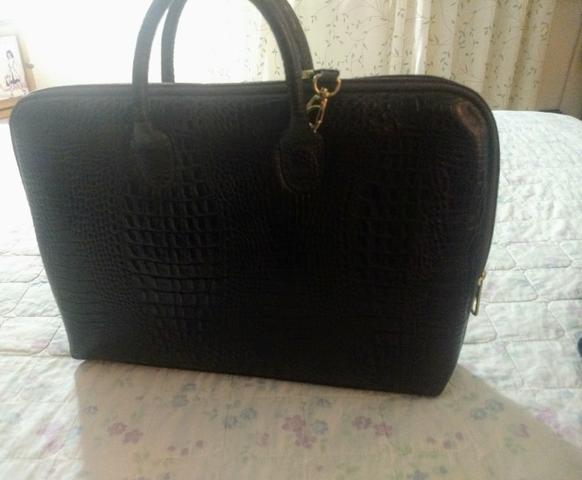 Bolsa marrom em couro puro
