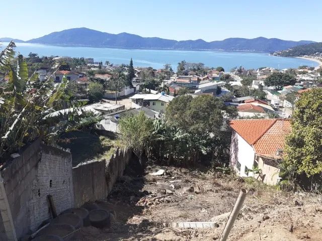 VENDO Terreno em frente a BR 101, ao lados moradores antigos, restaurante e posto gasolina - Foto 2