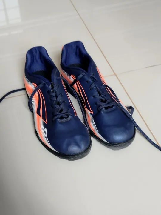 Chuteira society pênalti semi nova