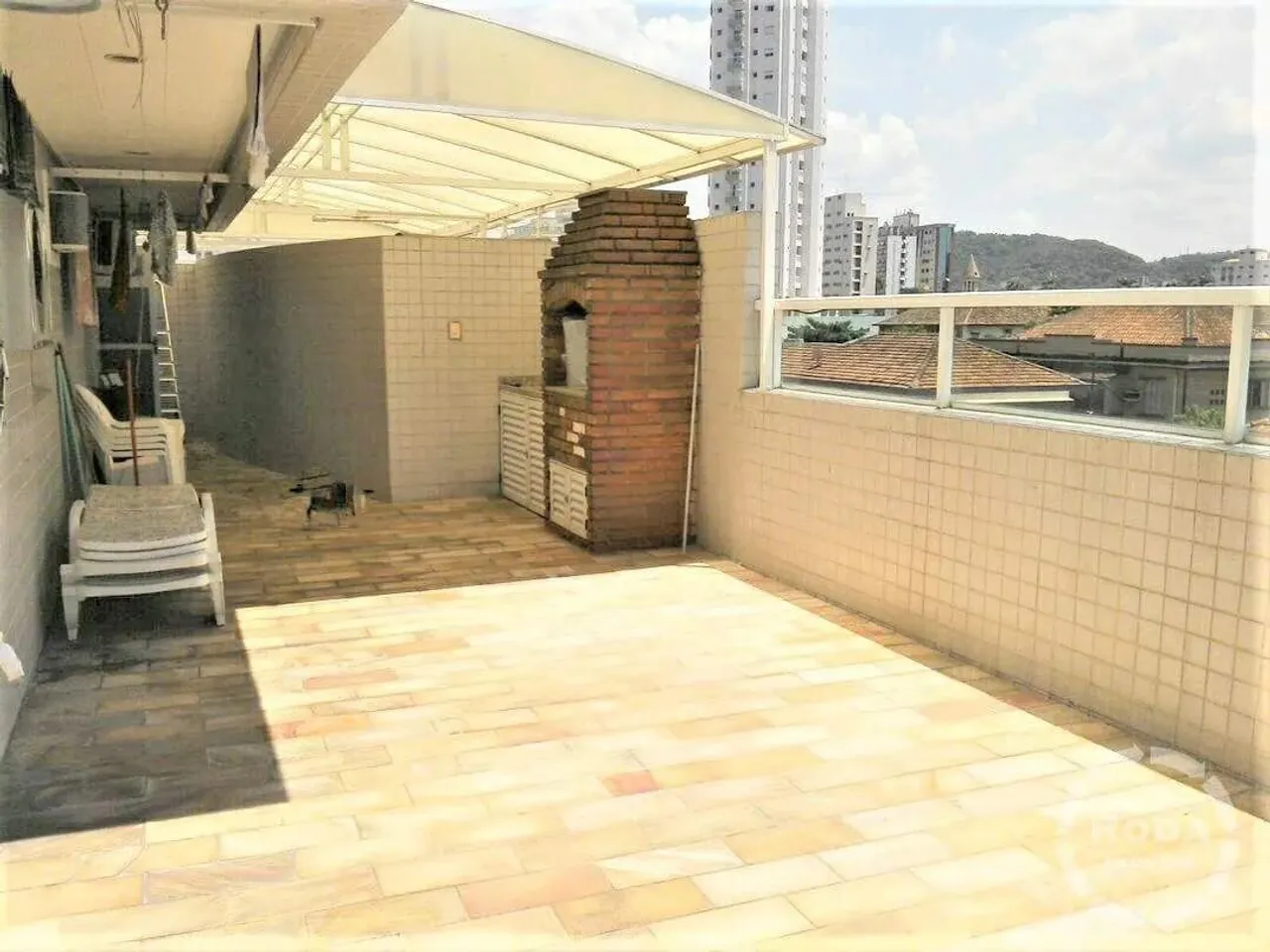 Apartamento Garden com piscina e churrasqueira para locação em Santos, localizado no bairr