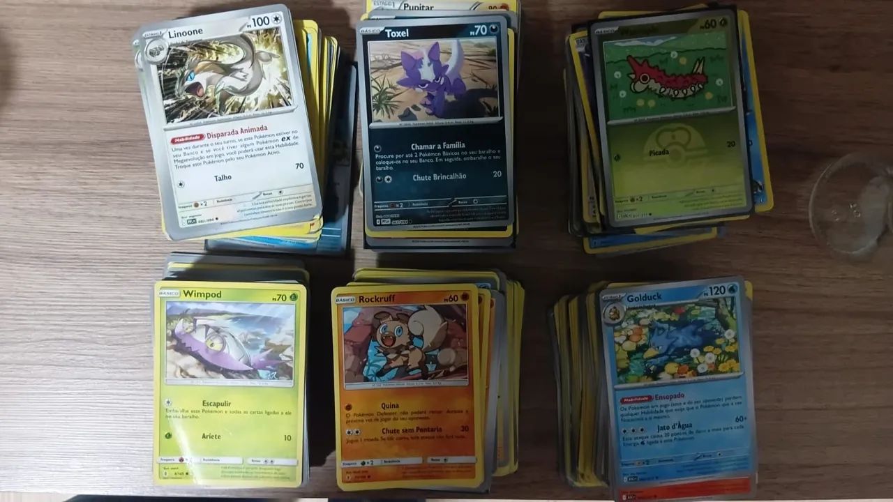 Pacote com 1100 cartas pokémon