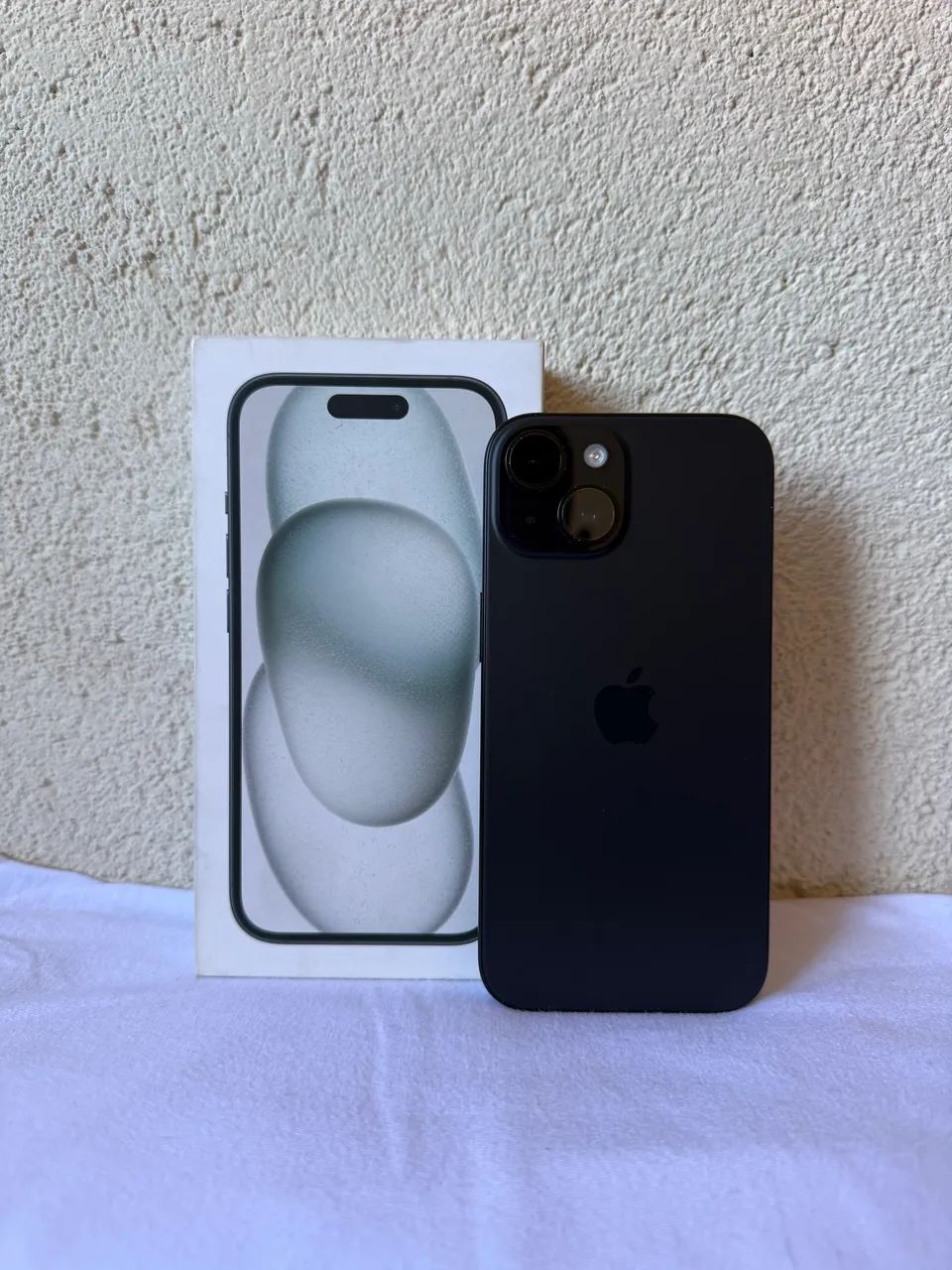 iPhone 15 (87% saúde da bateria)