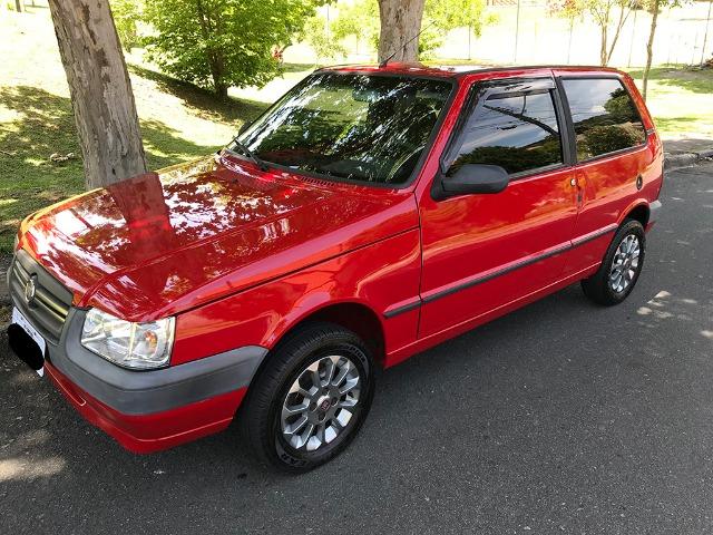 Fiat UNO Mille 10/11, vidro elet, alarme, rodas liga leve, todo original - Foto 2