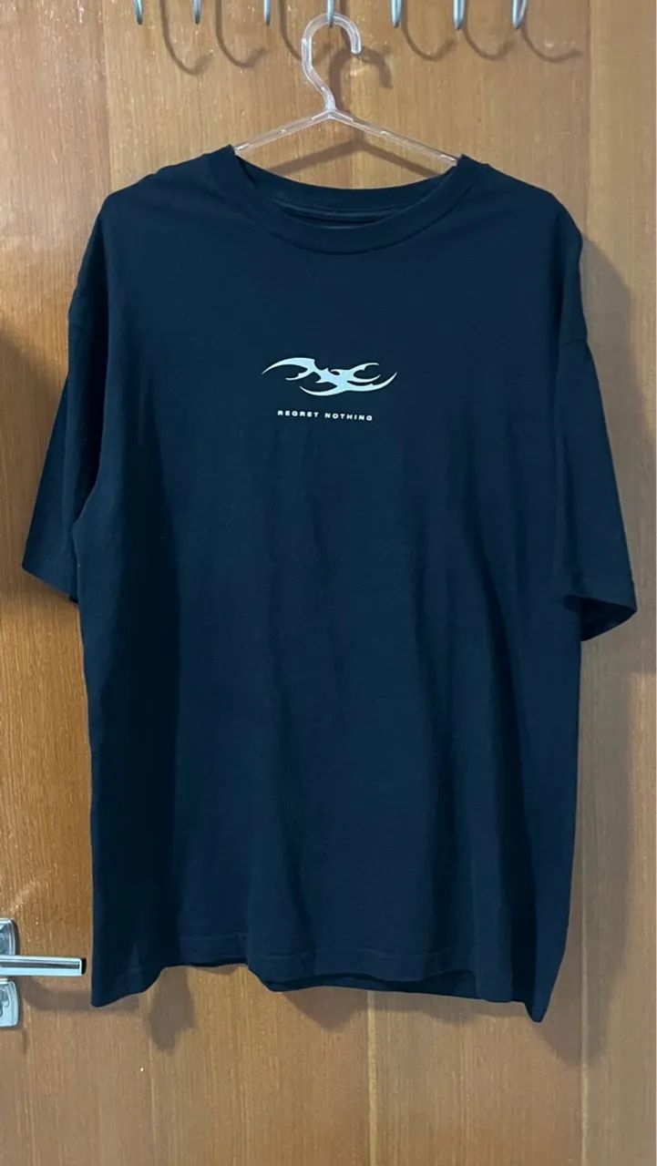 Camiseta oversized regret nothing  - Foto 4