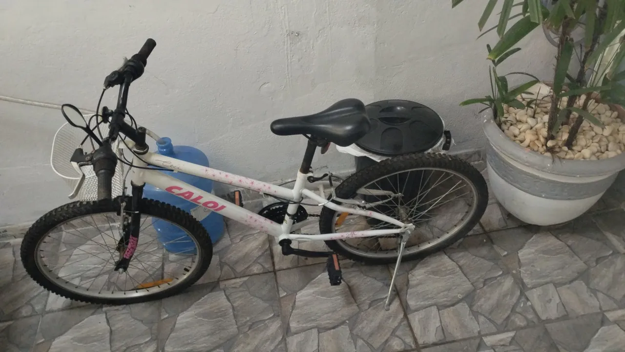 Vendo bicicleta infantil com marcha aro 26