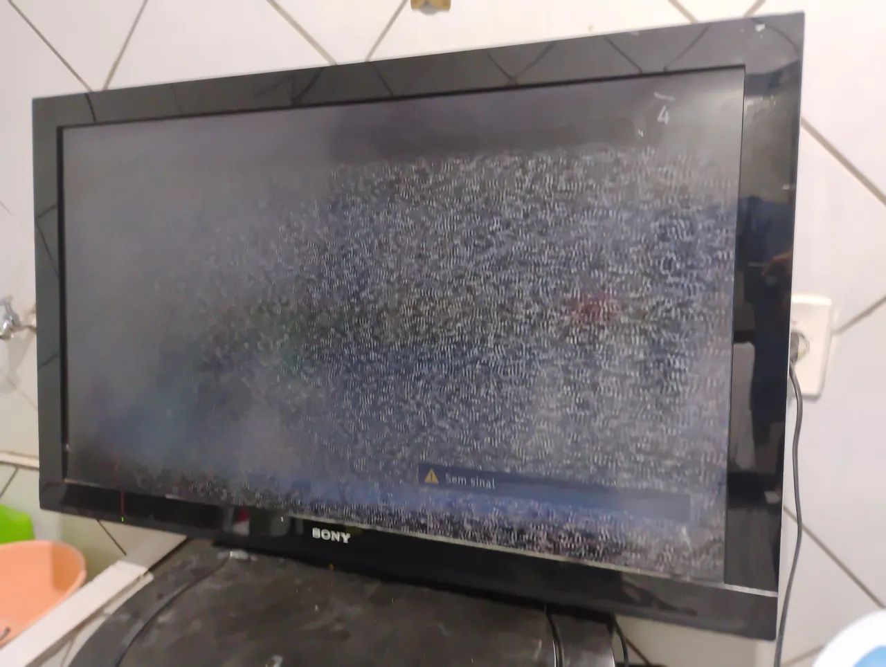 TV to remove parts. Has a spot on the screen but it's still possible to watch64313037816321121