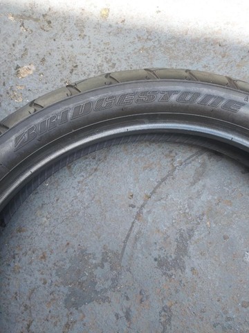 pneu usado Bridgestone battle Wing 110/80-19 - Foto 2