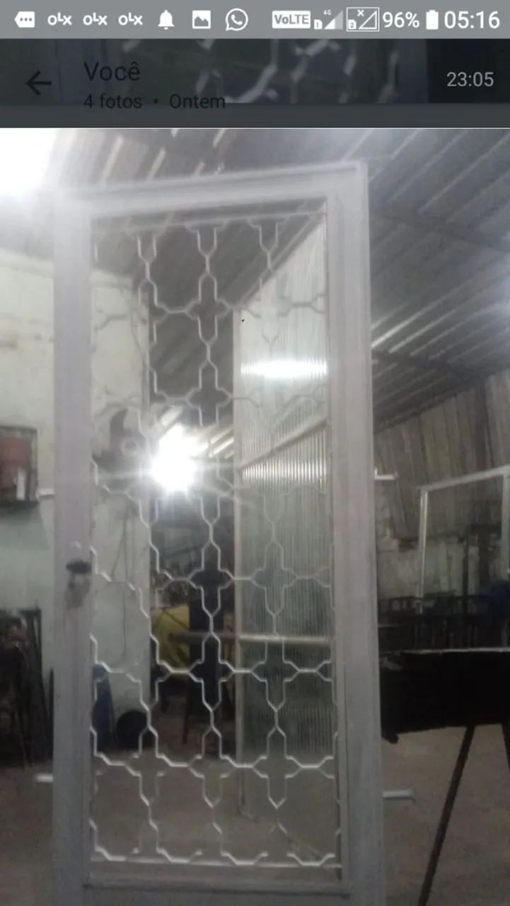 Ornately crafted door with a small side door64750513810946122