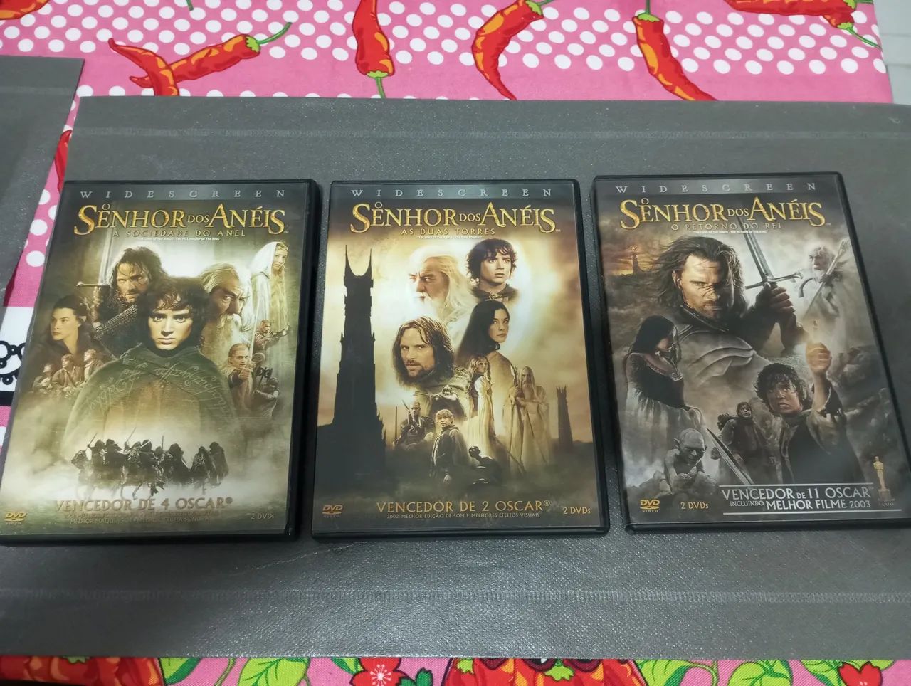 Coleção Dvds trilogia O senhor dos anéis  - Foto 2