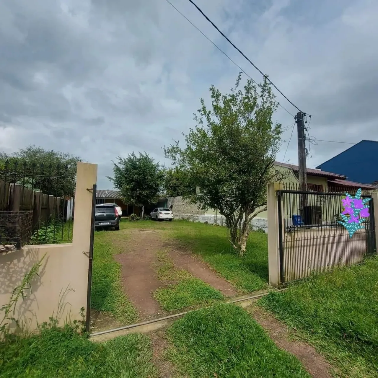 Terreno de 440m² com casa em Gravataí