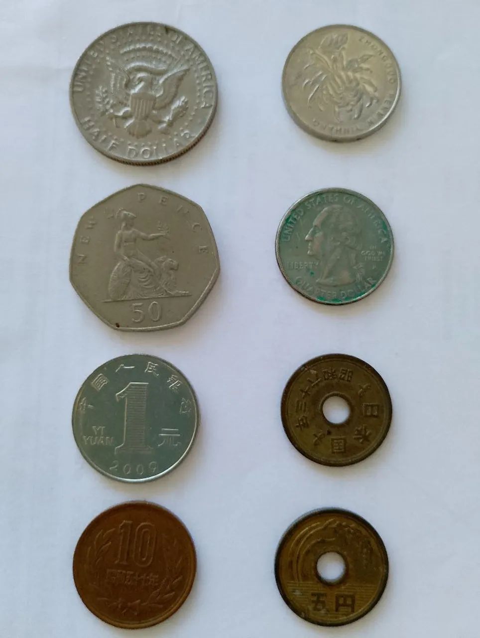 Coleção de Moedas Americanas Inglesas Chinesas e Japonesas antigas.