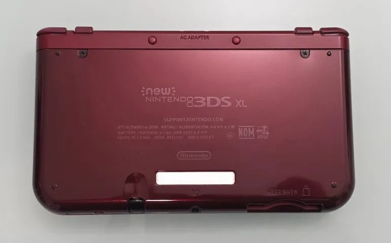 Videogame New 3DS XL Vermelho 128GB Portátil com acessórios e Jogo