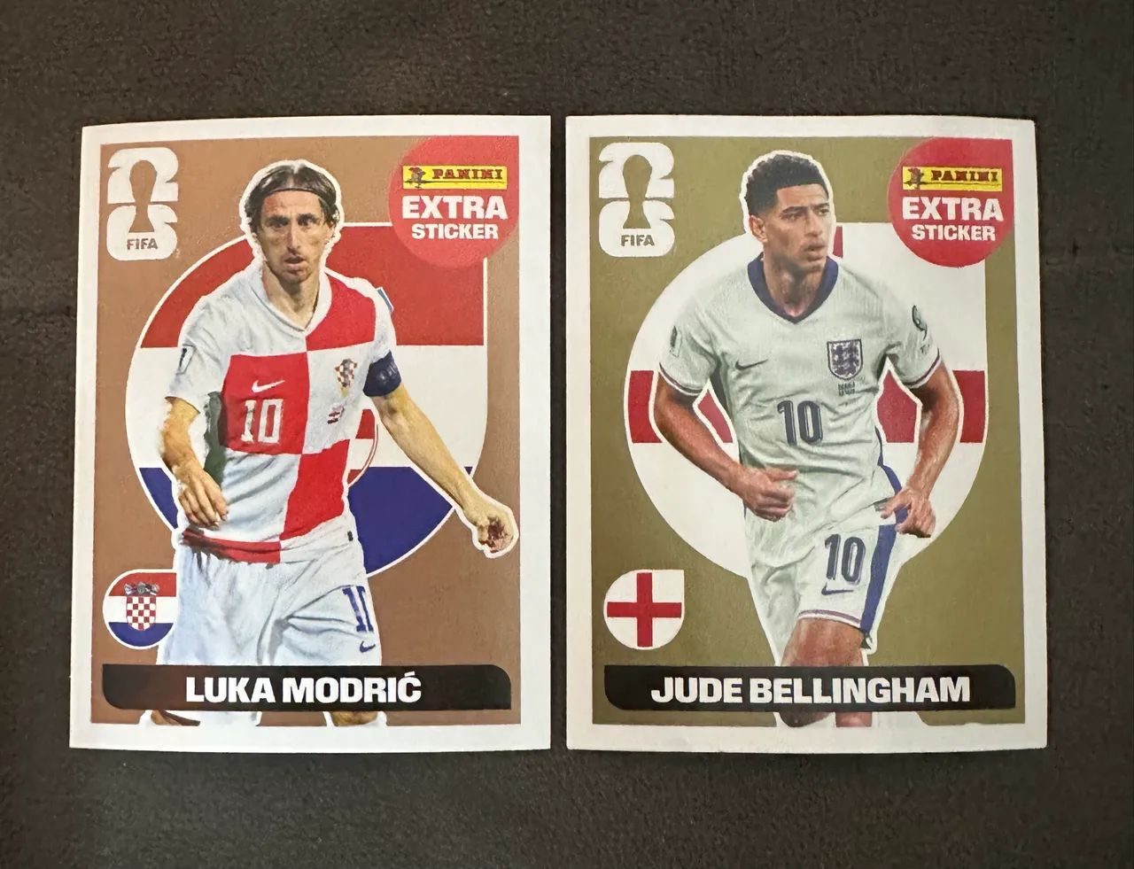Figurinha Extra Legend Panini Copa 2026 Ouro e Bronze 