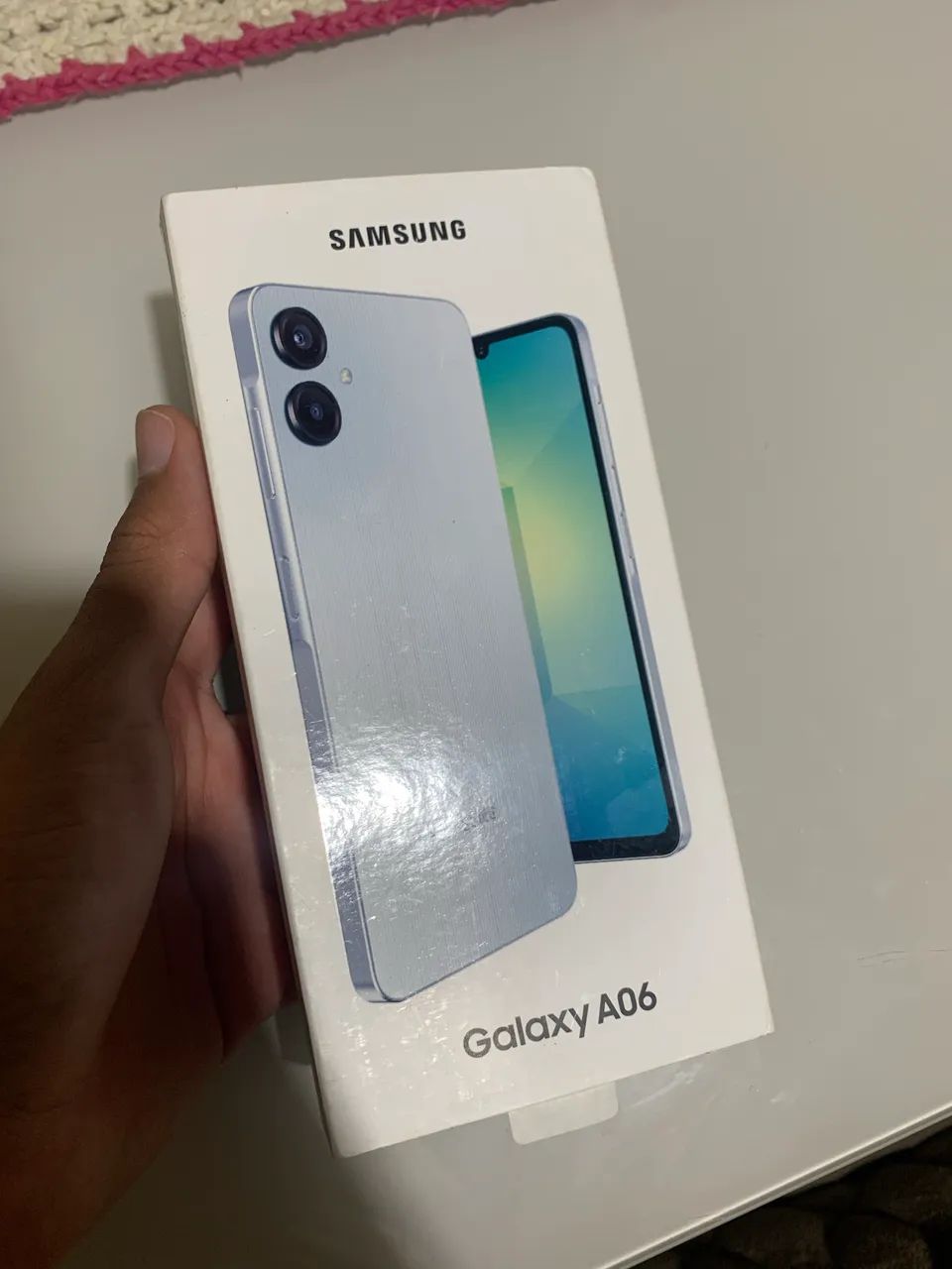 Celular A06- 128G está com caixa 