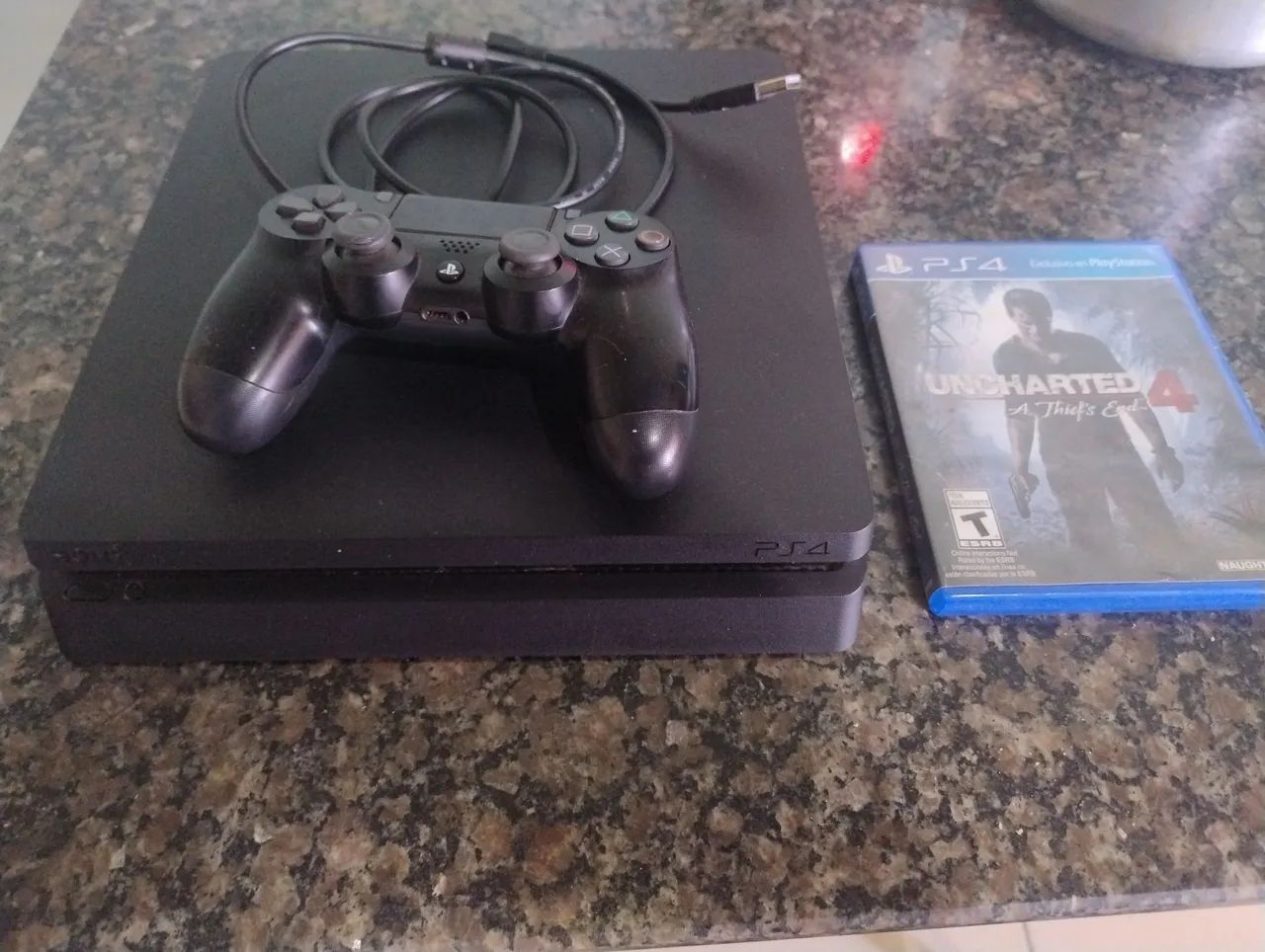 PS4 Slim + Jogo Uncharted 4 + eacf 24 + read redemption 2+ GTA v