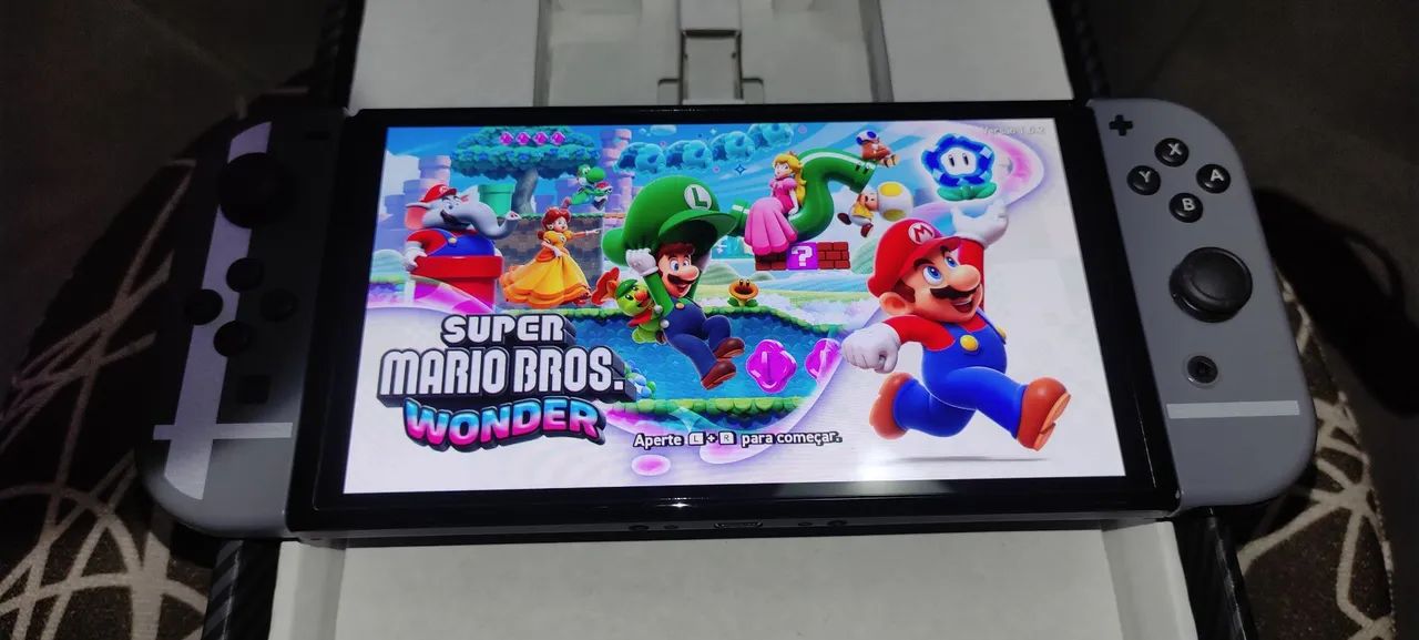 Switch Oled Super Smash Bros  - impecável - bloqueado  - Foto 3