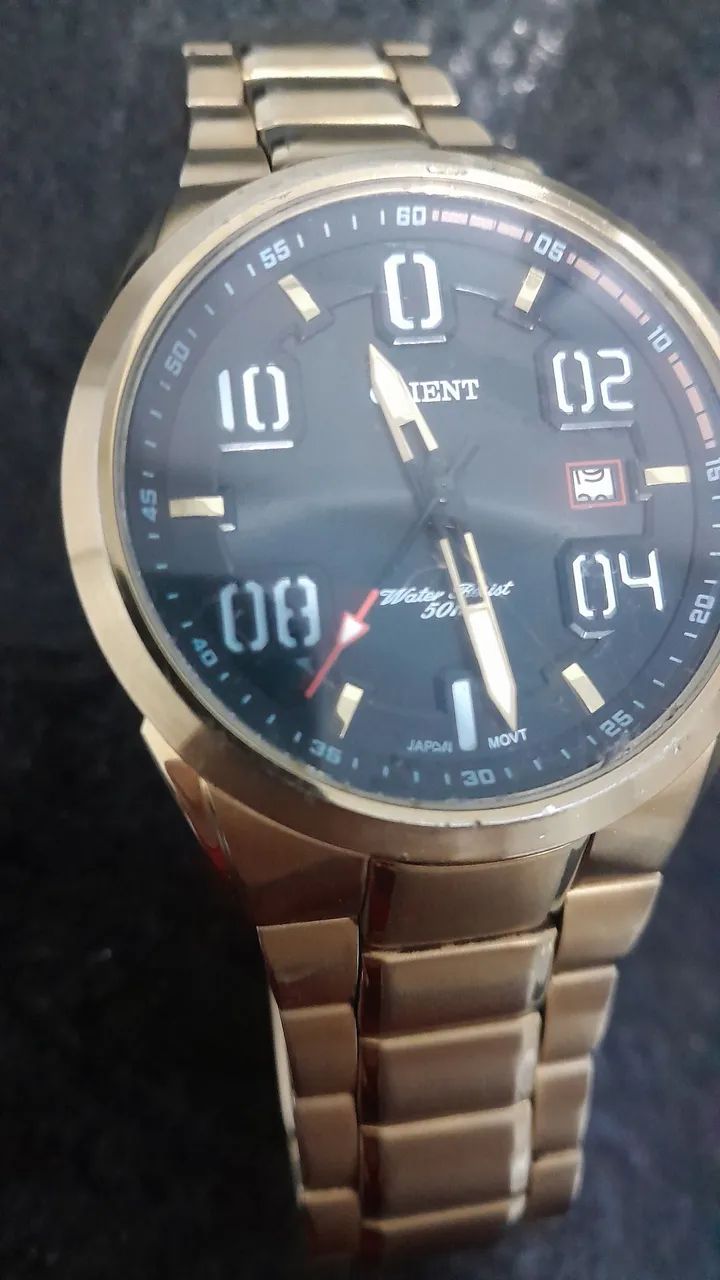 Relógio Orient dourado a prova da água  - Foto 2