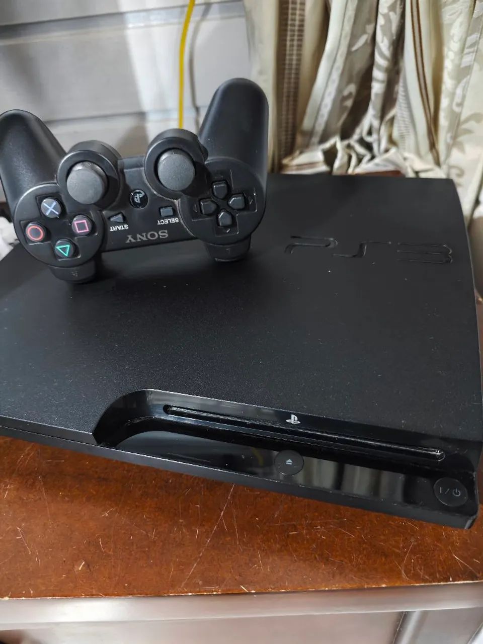 PS3 slim só pegar e jogar vários jogos no hd - Foto 4
