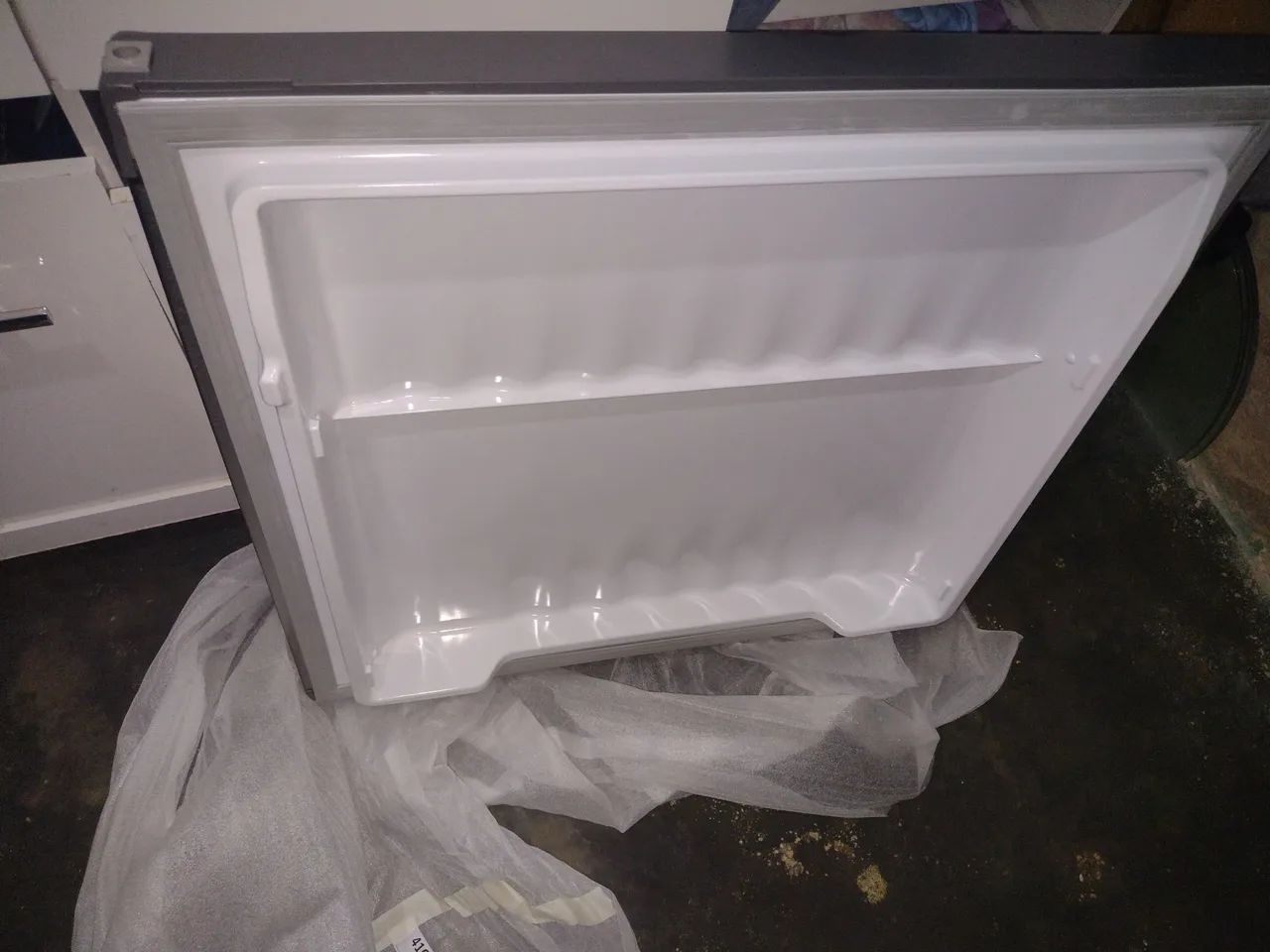 Tampa  do freezer da Eletrolux im8s nova na caixa 