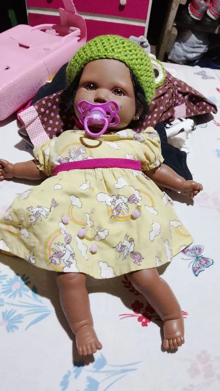Lote de brinquedos e boneca