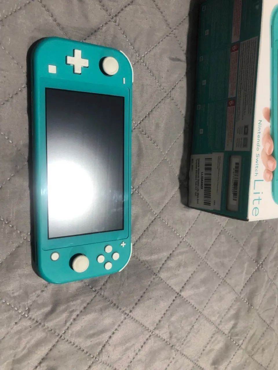 Nintendo Switch Lite + Resident Evil 4