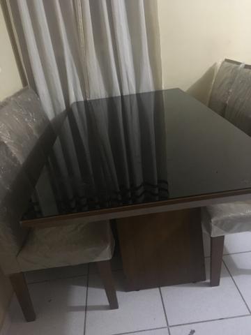 Vendo ou troco por uma de quatro cadeiras